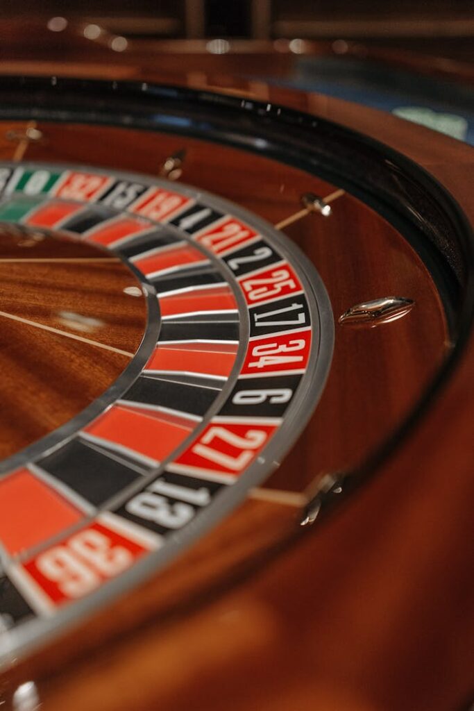 Dubibet Online Casino Lobby | Official Access & Member Login Detailed close-up of a roulette wheel in a casino, focusing on numbers and colors.